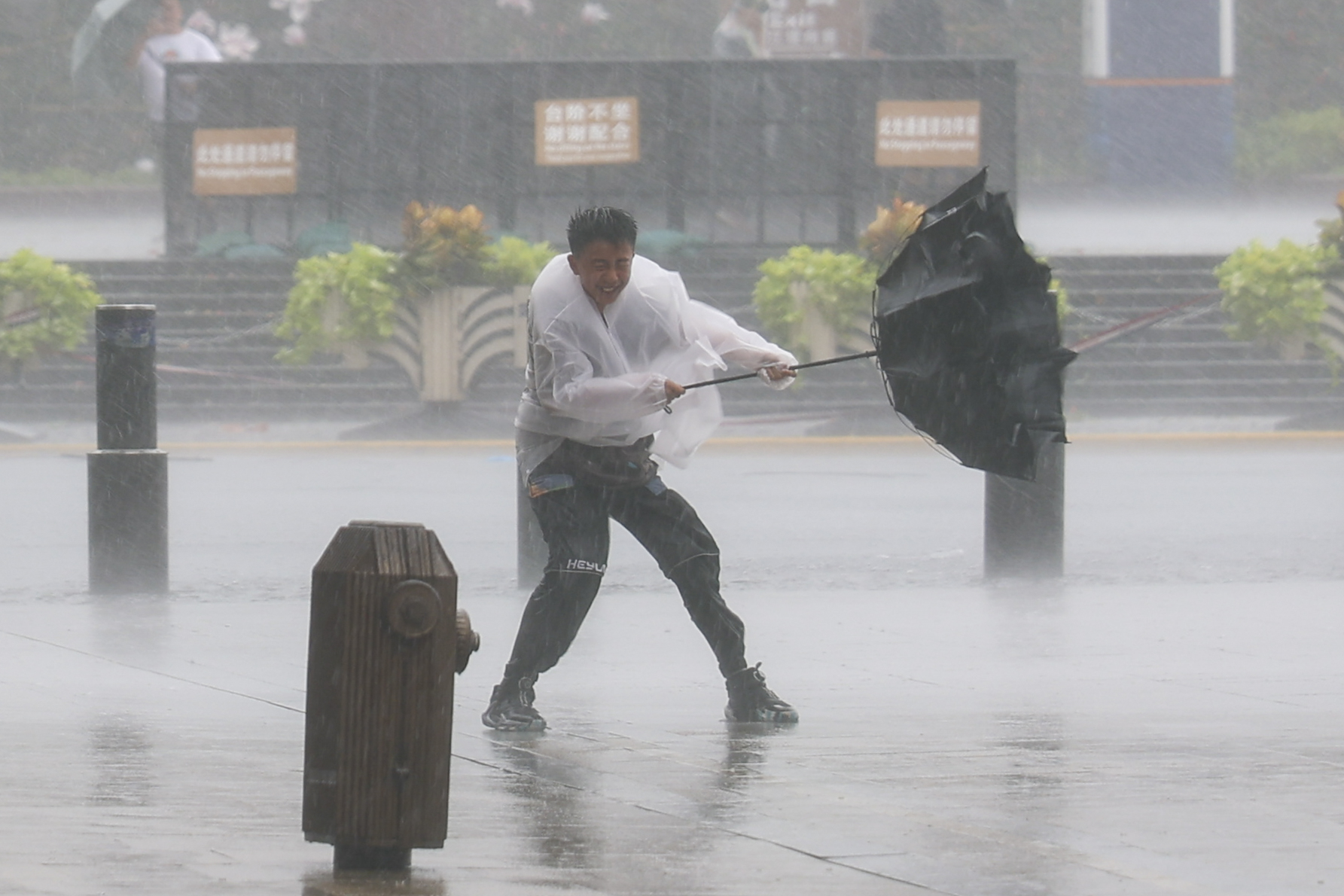 Hundreds of thousands evacuated as Typhoon Dolphin brings heavy rain to eastern China