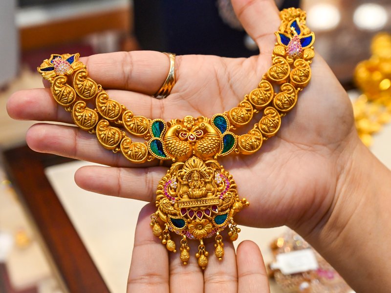 Gold slips lower as US inflation raises Fed rate hike odds